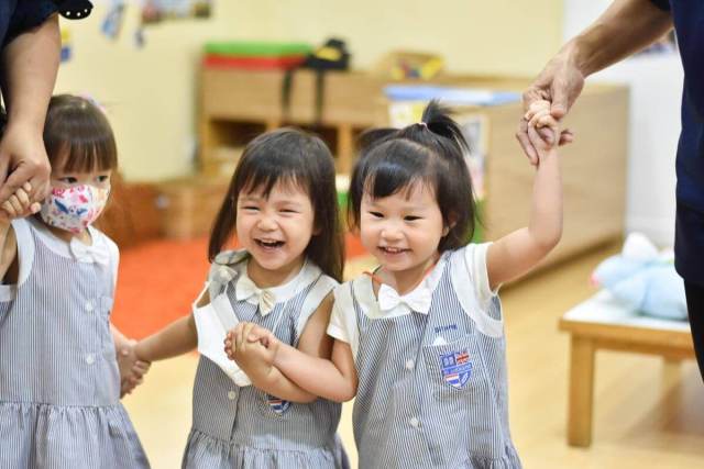 THREE GIRLS LAUGHING