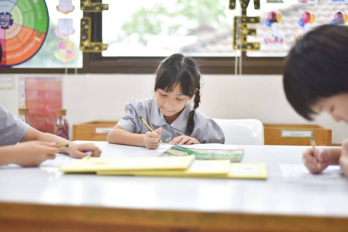 Primary students completing an assessment activity at St Andrews Dusit